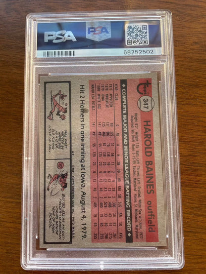 1981 Topps Harold Baines RC #347 PSA 7 EXMT baseball card featuring stats, White Sox and Orioles history.
