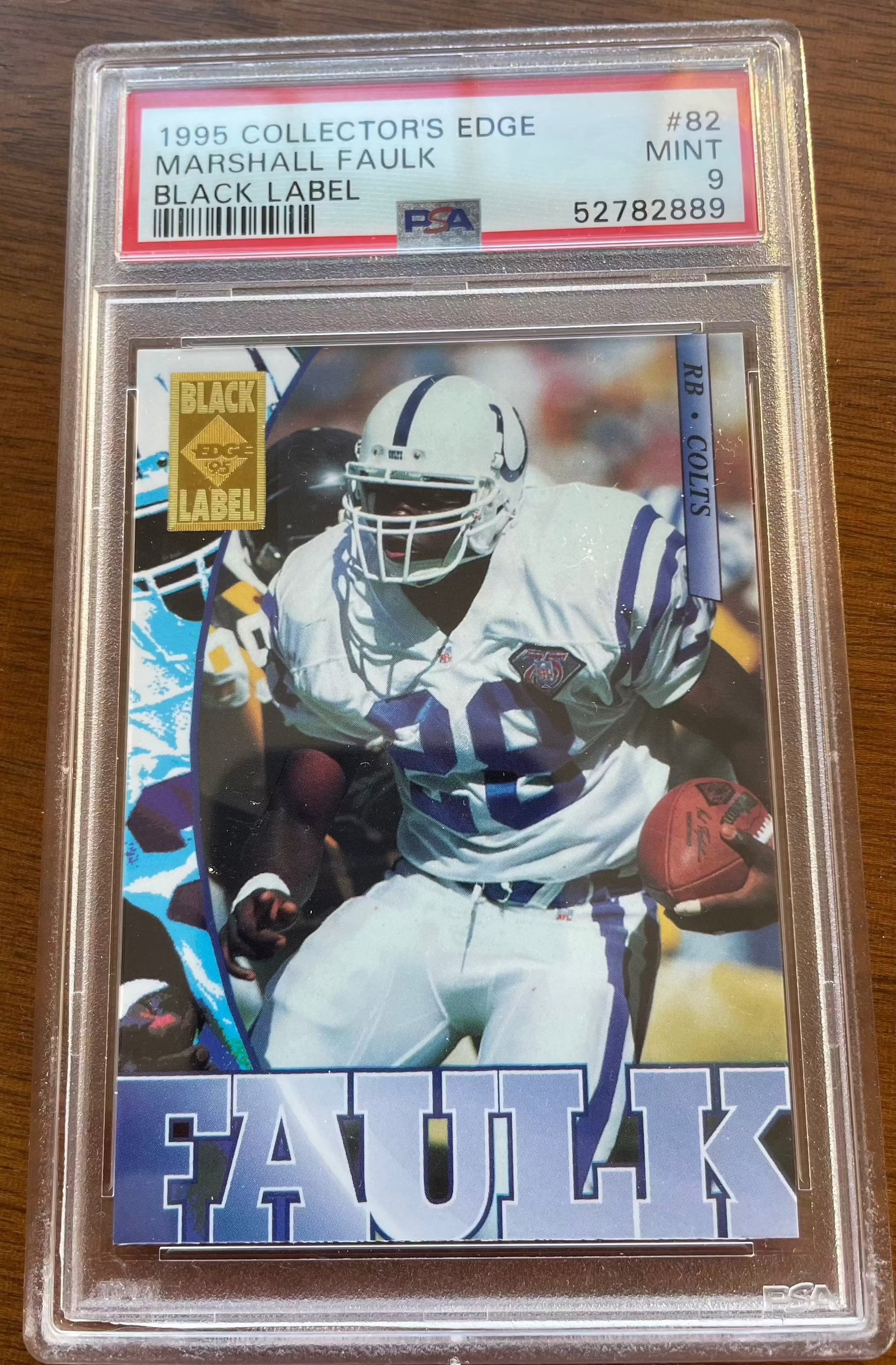 Edge Black Label 82 Marshall Faulk PSA 9 football card in protective case.