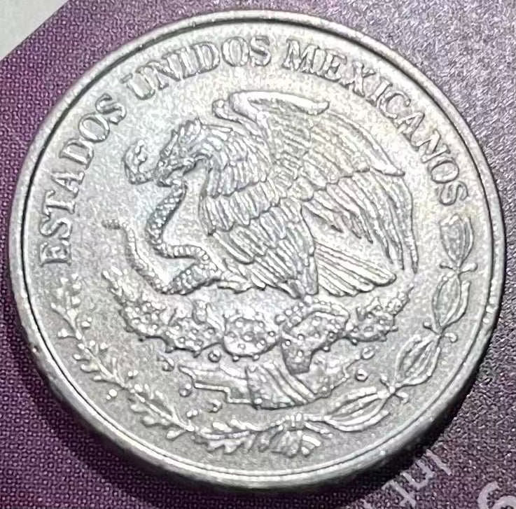 2016 Mexico 50 Centavos coin in mint condition, showing intricate design.