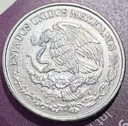 2016 Mexico 50 Centavos coin in mint condition, showing intricate design.