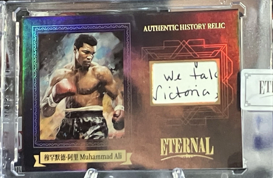 Eternal Muhammad Ali relic card with handwritten manuscript fragment featuring the word "Victoria"