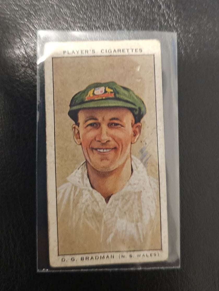 1934 Player's Cricketers Tobacco card featuring Don Bradman, rare cricket collectible.