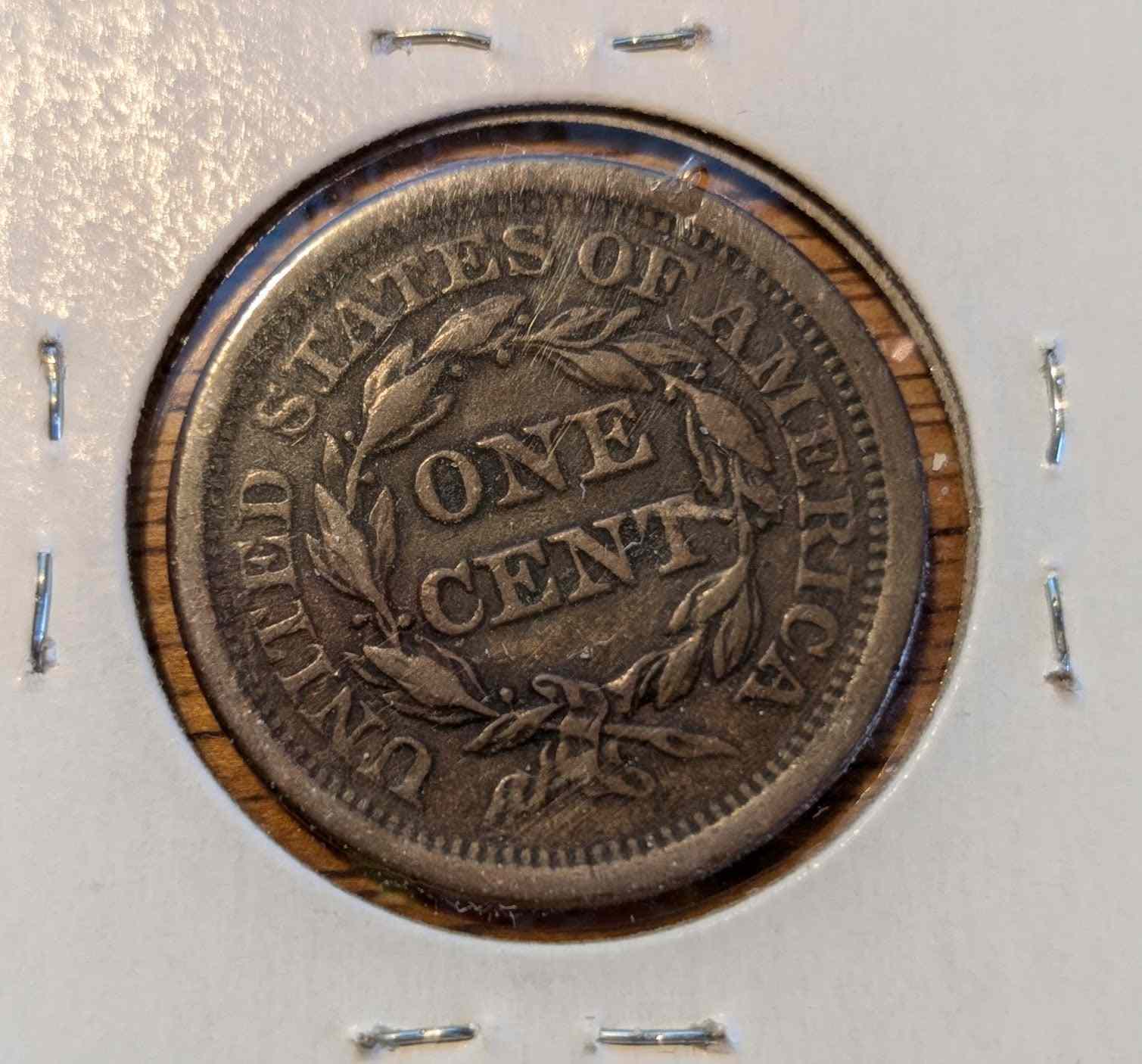1852 braided hair large cent in extremely fine condition.
