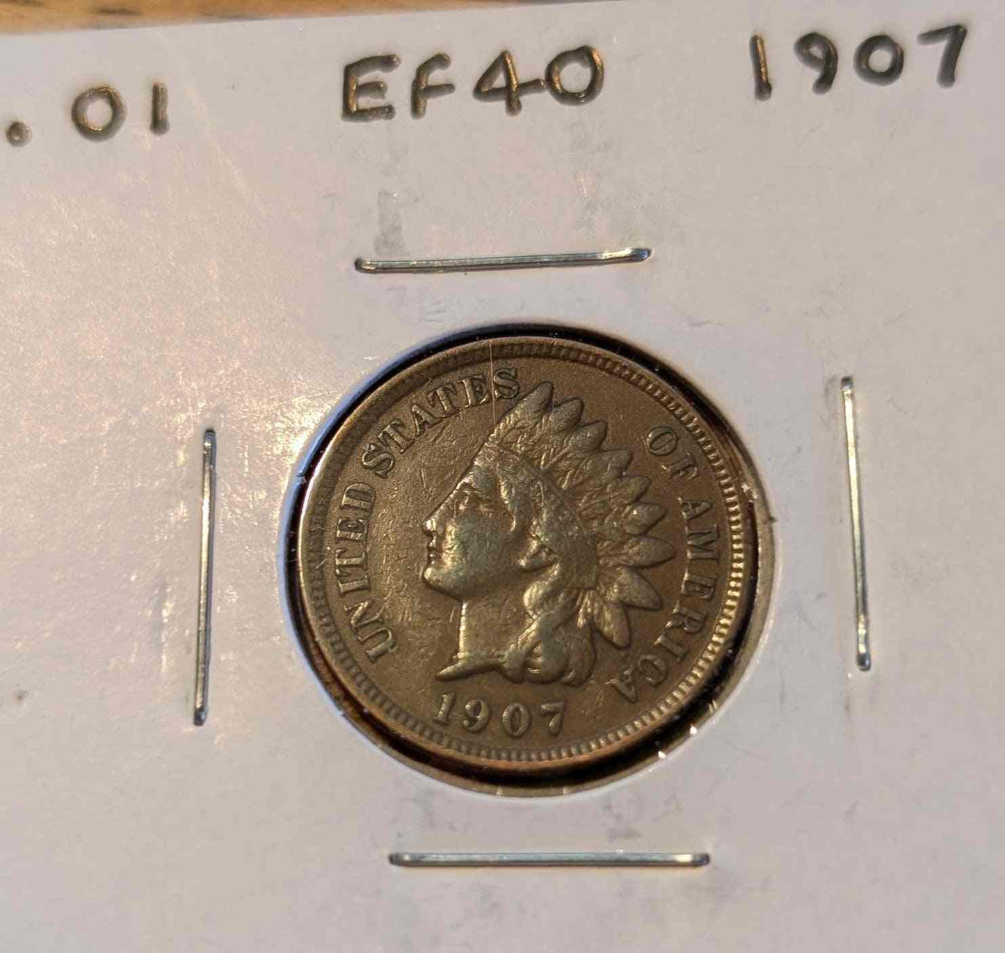 1907 Indian Head Cent coin in excellent condition.