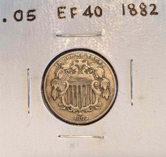 1882 Shield Nickel in EF40 condition with intricate shield design.