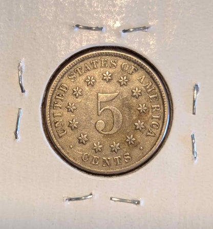 1882 Shield Nickel EF40 condition with intricate shield design.