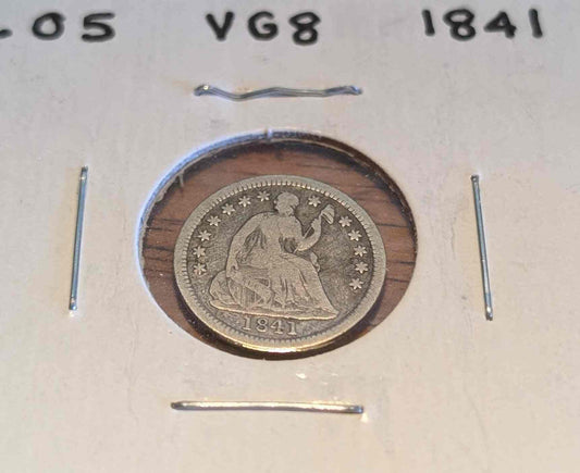 1841 Liberty Seated silver coin with stars, original luster, and detailed engravings, ideal for collectors.