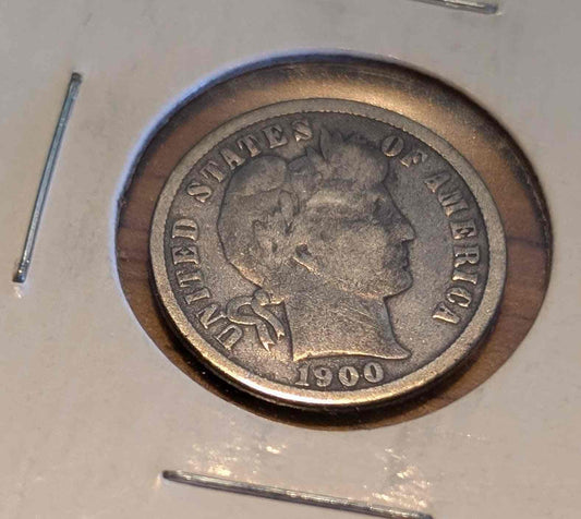 1900 Barber Dime showcasing moderate wear, crafted from 90% silver and 10% copper.