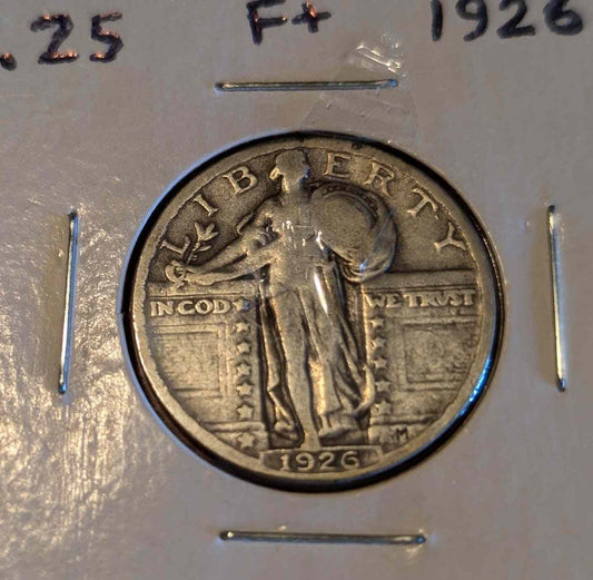 1926 Standing Liberty Quarter in fine silver, collectible coin.