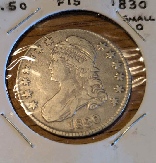 1830 Capped Bust Half coin (small O) with intricate design.