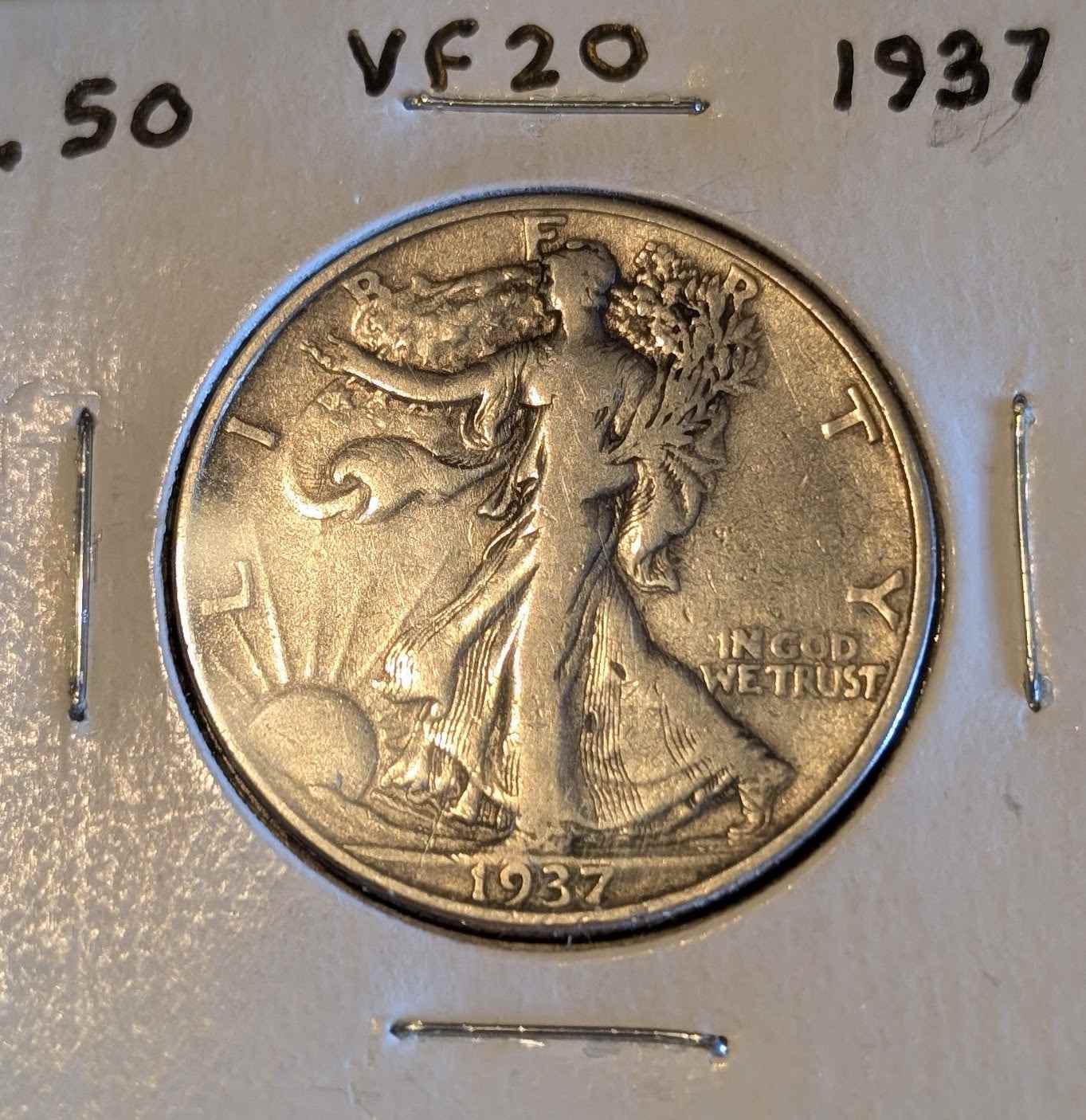1937 Walking Liberty Half coin, VF20 grade, collectible numismatic item.