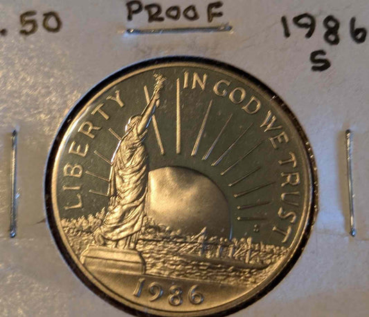 1986 S US Mint proof coin featuring Statue of Liberty design.