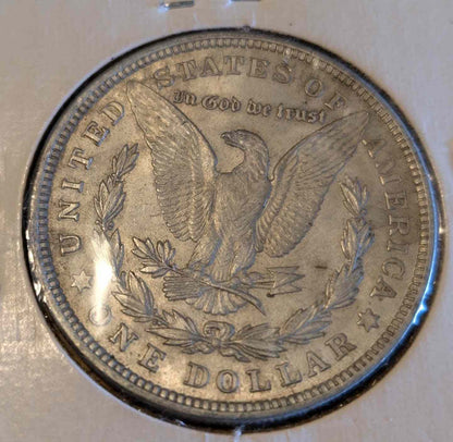 1921 Morgan Silver Dollar coin with eagle design in excellent condition.