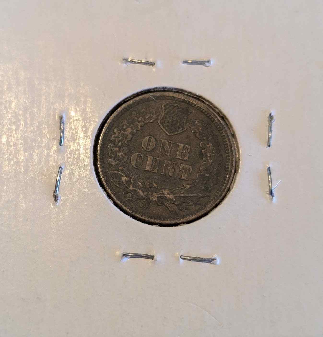 1863 Indian Head Cent coin with intricate design and excellent details.