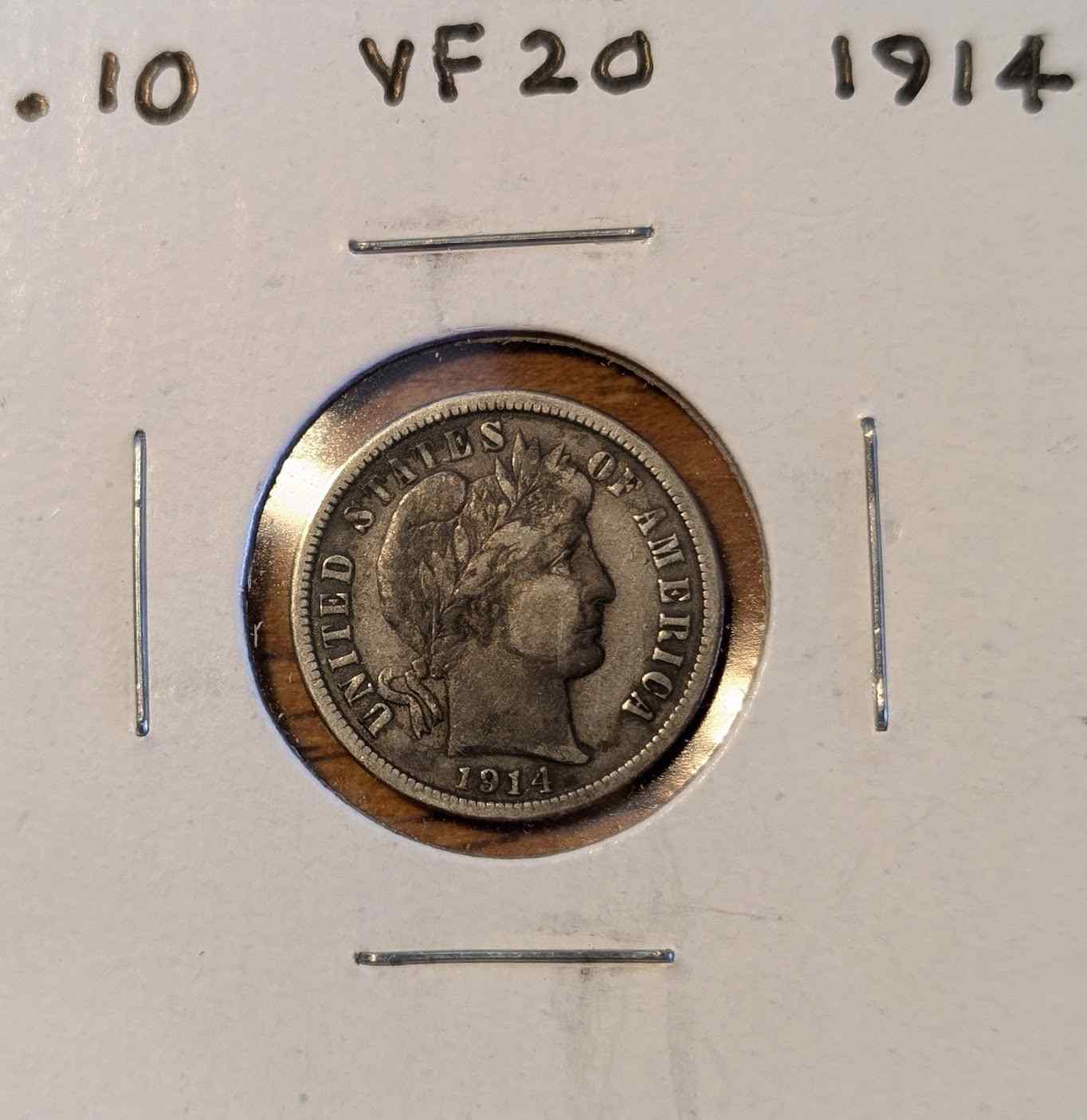 1914 Barber Dime VF20 collectible coin.