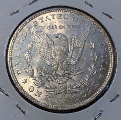 1885 O Morgan Silver Dollar, Brilliant Uncirculated quality, featuring iconic American design.