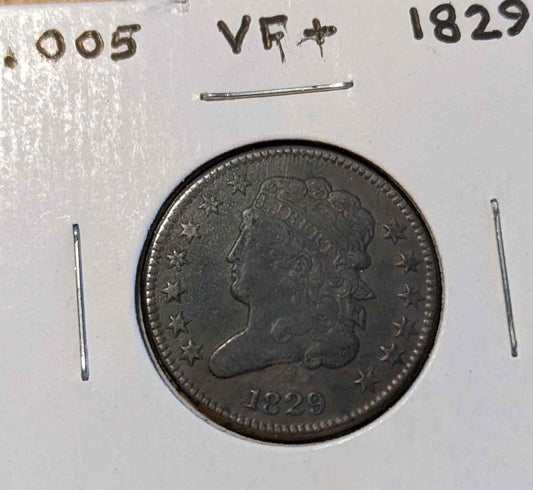 1829 Classic Head Half Cent coin with elegant design displayed in protective holder.