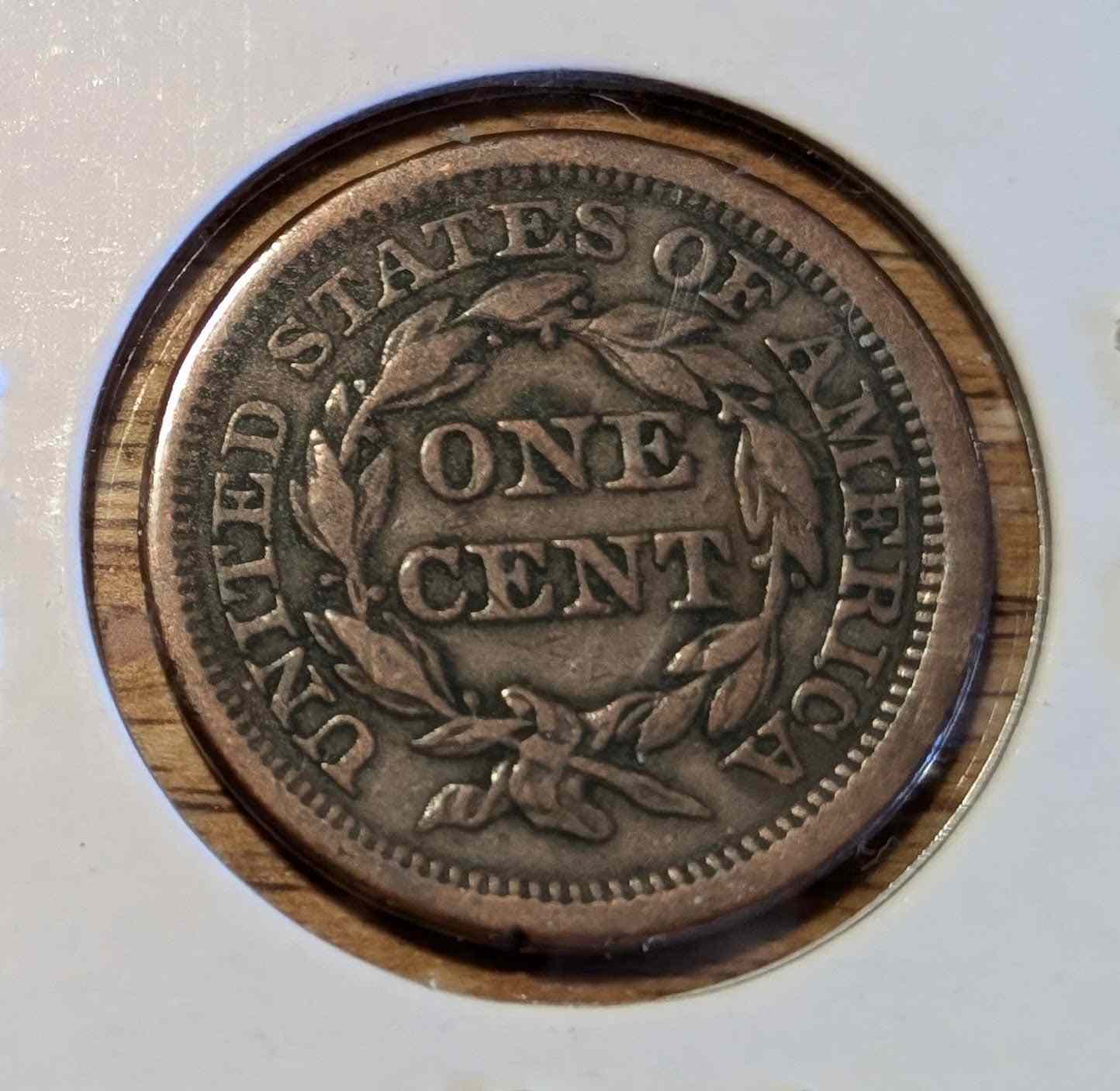 1853 Braided Hair Large Cent EF40 coin, collector's item with intricate design.