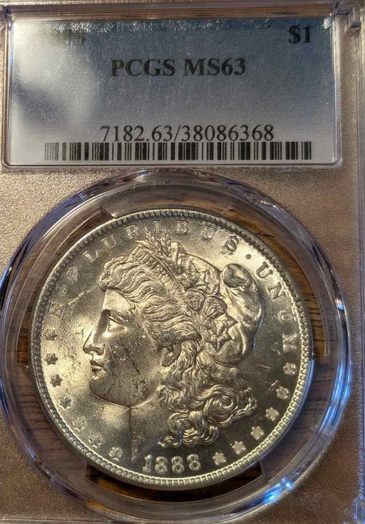 1888 MS63 Morgan Silver Dollar in protective case.