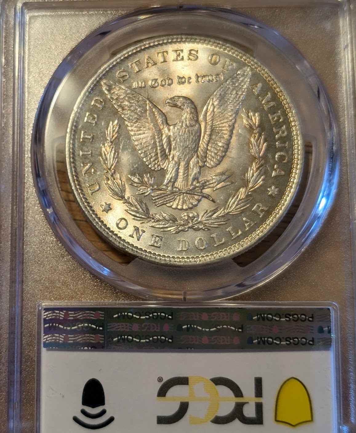 1889 Morgan Silver Dollar MS62 in protective case.