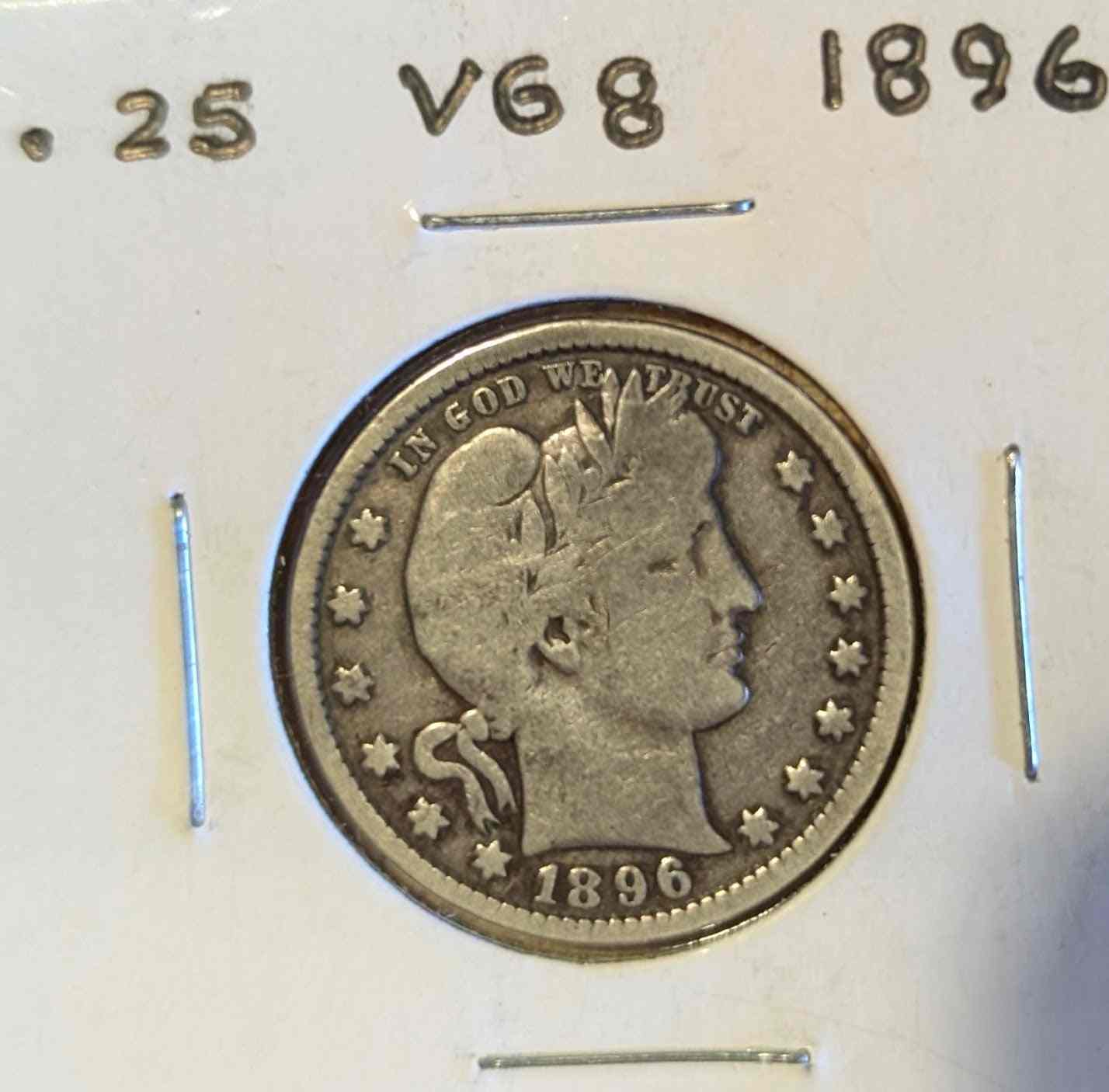 1896 Barber Quarter coin in VG8 condition with detailed design.