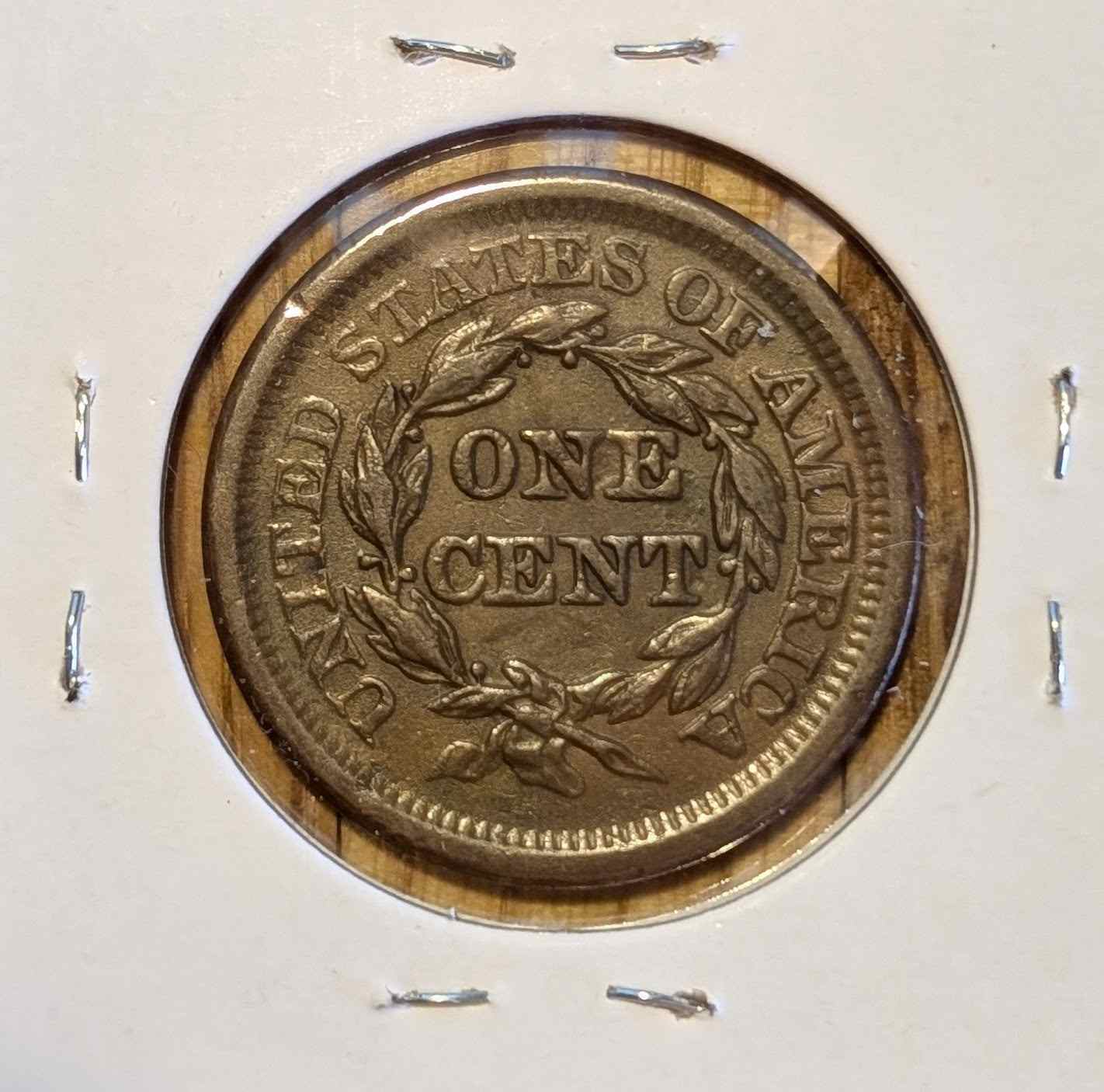1851 Braided Hair Large Cent in extremely fine condition displaying intricate detailing.