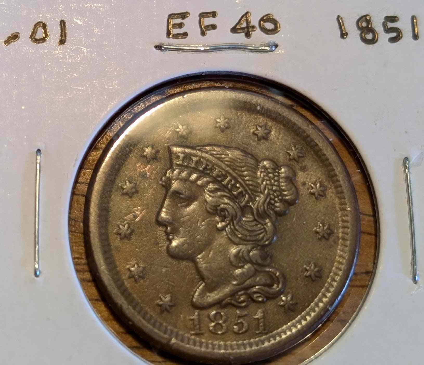 1851 Braided Hair Large Cent in extremely fine condition showcasing intricate braids and historical detail.