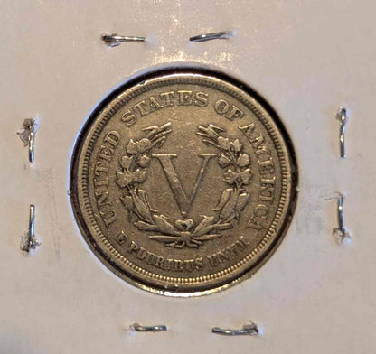 1883 Liberty Head Nickel coin in protective holder, historical collectible.