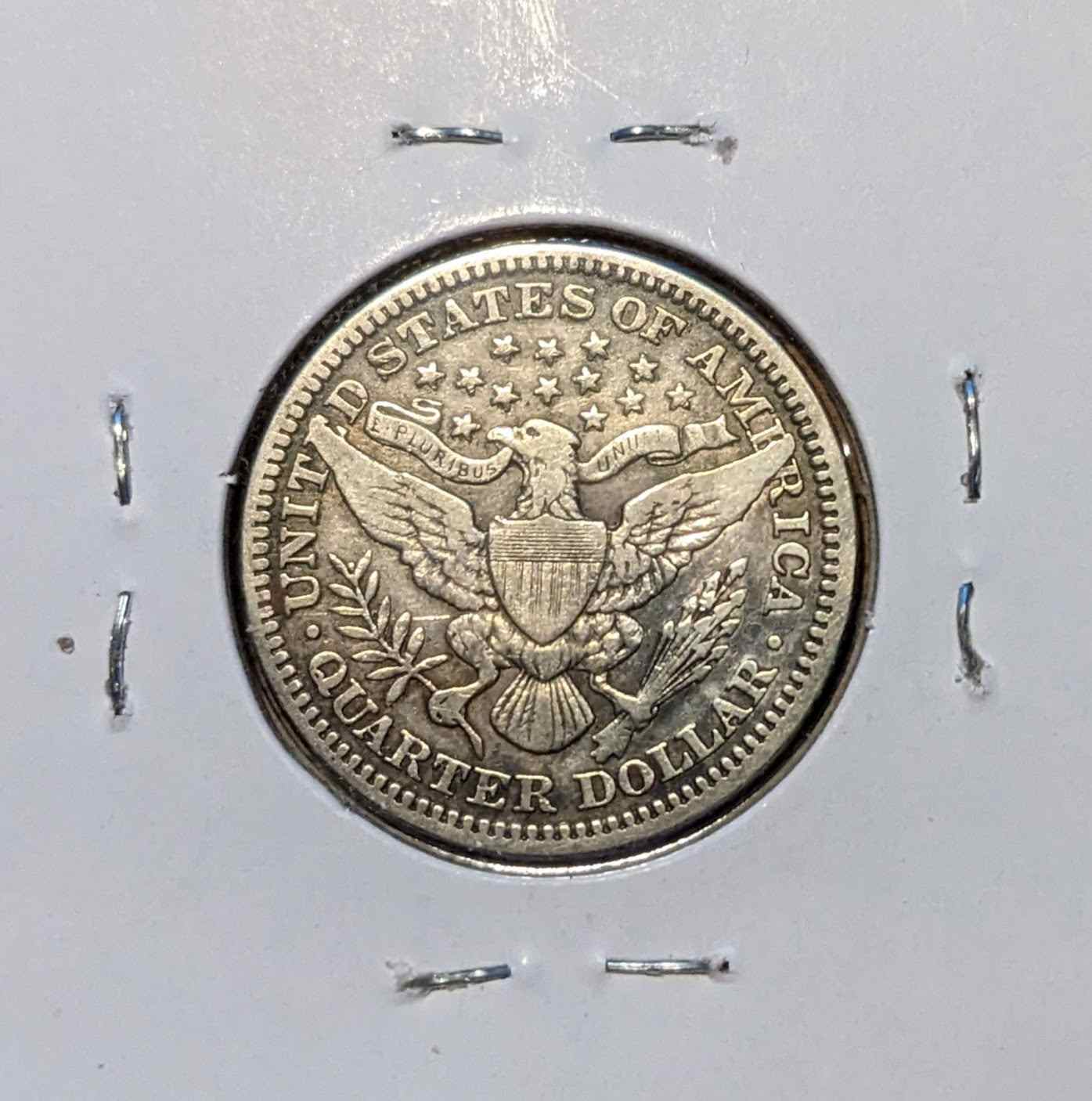 1914 Barber Quarter coin made of 90% silver, highly sought after by collectors.