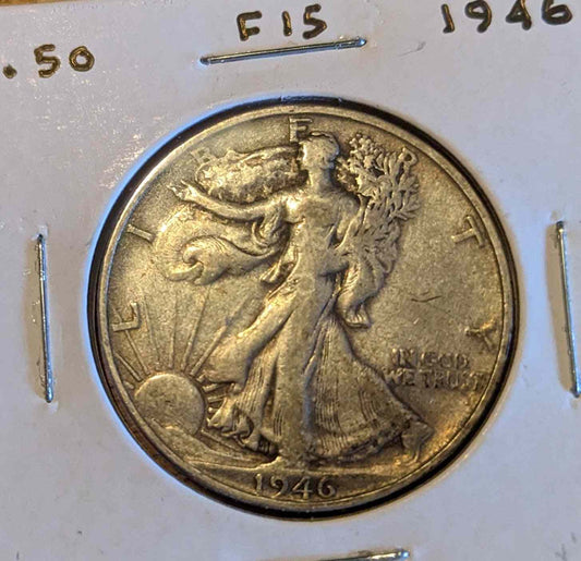 1946 Walking Liberty Half coin featuring Lady Liberty in stride, post-WWII collectible.