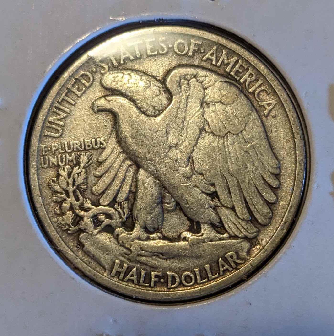 1946 Walking Liberty Half, post-WWII coin showing Lady Liberty, collectible item.