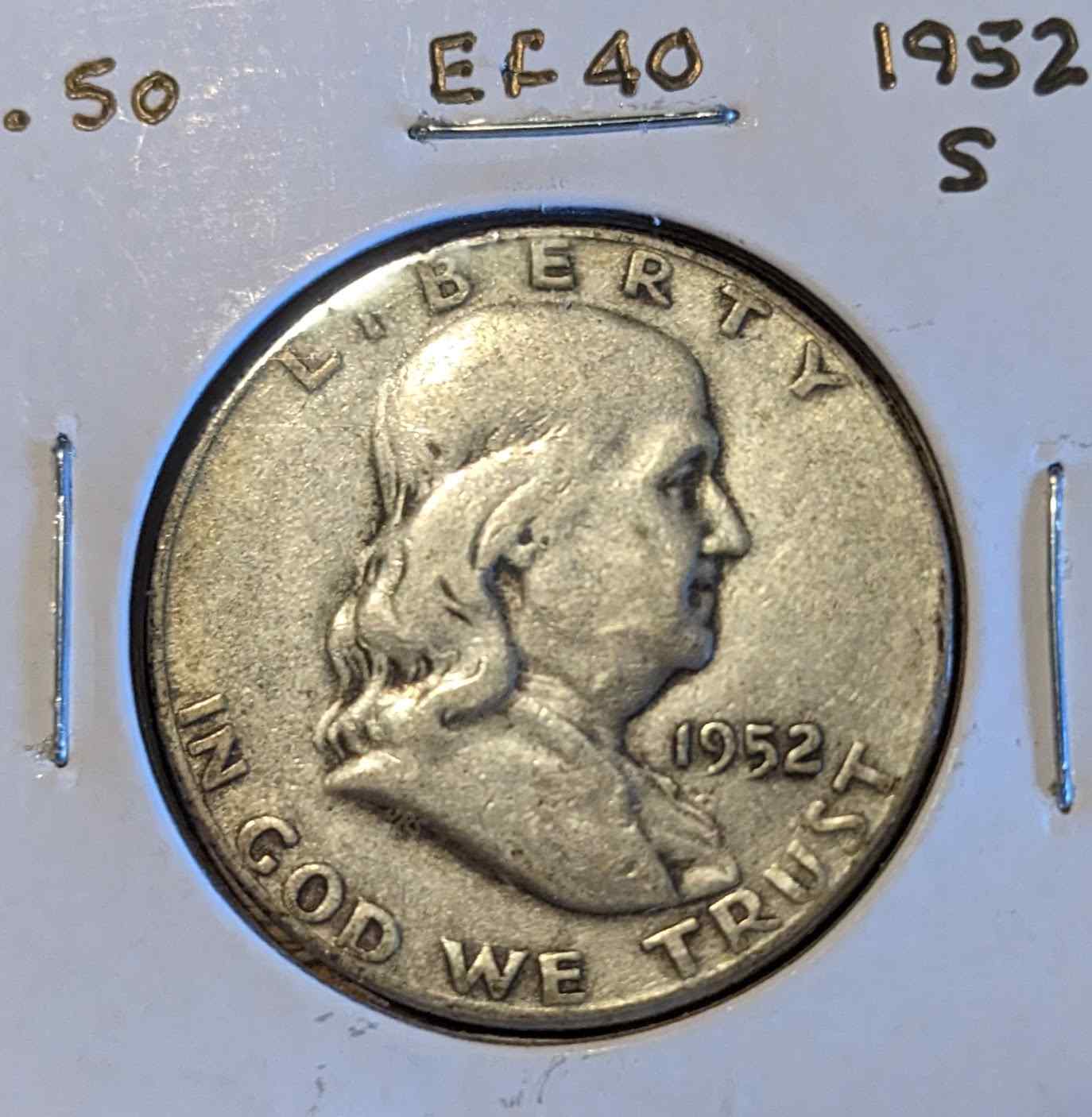 1952 S Franklin Half Dollar coin featuring Benjamin Franklin profile.