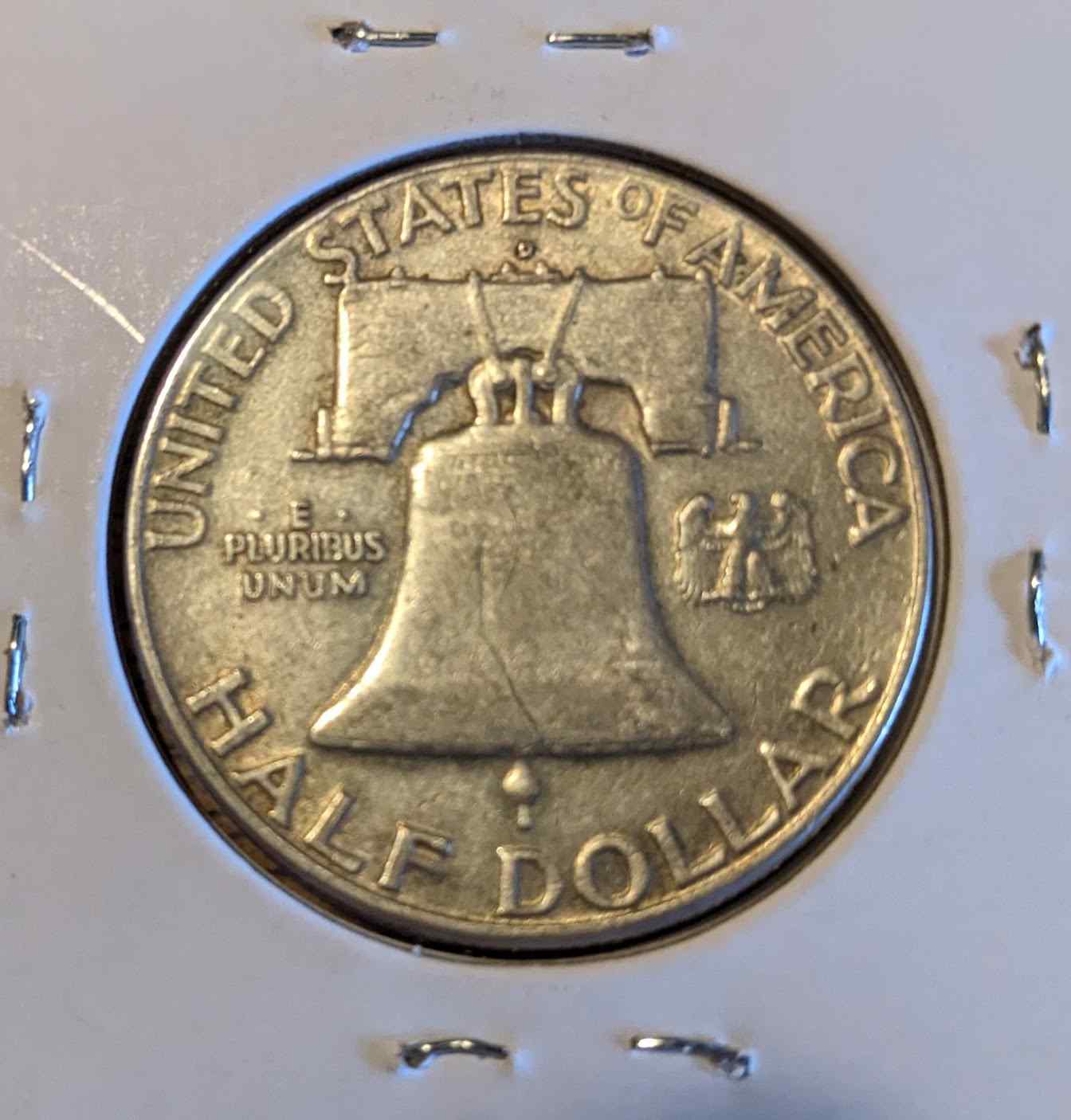 1960 D Franklin Half Dollar featuring Benjamin Franklin and Liberty Bell.