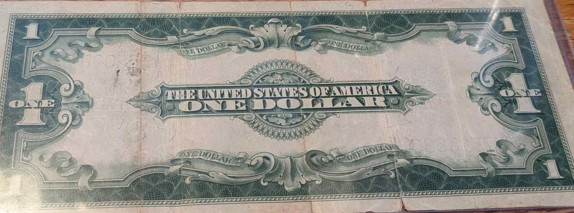 1923 US Large Silver Certificate with blue seal and ornate design.