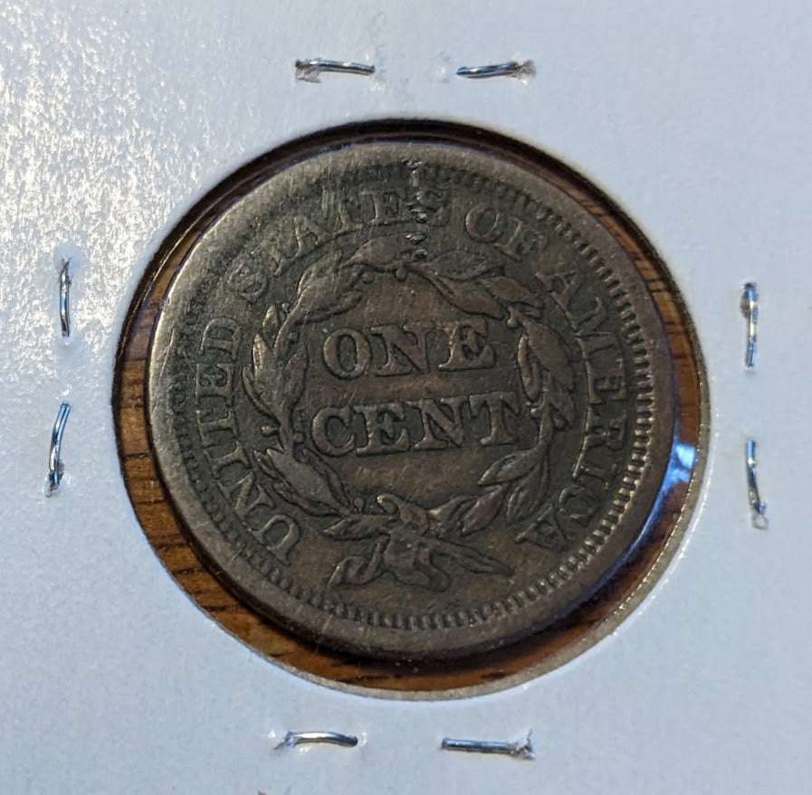 1853 Braided Hair Large Cent with wreath design on reverse, collectible copper coin.
