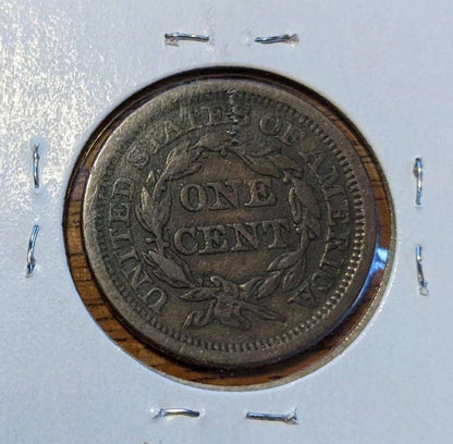 1853 Braided Hair Large Cent with wreath design on reverse, collectible copper coin.