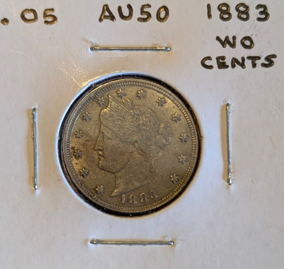 1883 Liberty Head Nickel (no cents) in almost uncirculated condition.