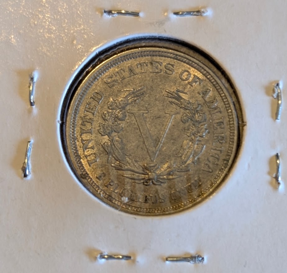 1883 Liberty Head Nickel (no cents) in almost uncirculated condition.