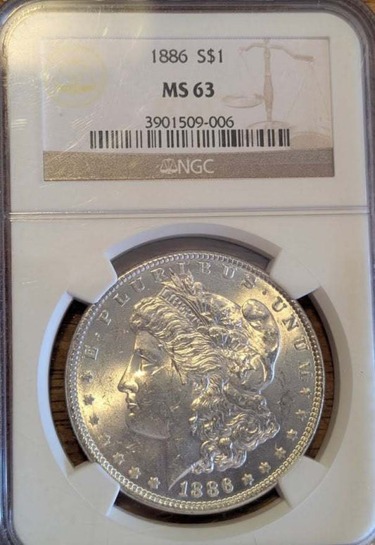 1886 Morgan Silver Dollar MS63 graded coin in protective display.