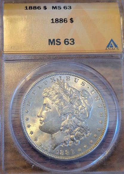 1886 Morgan Silver Dollar graded MS63 in protective case.
