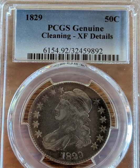1829 Morgan Silver Dollar with Lady Liberty and eagle design, fine quality coin in protective case.