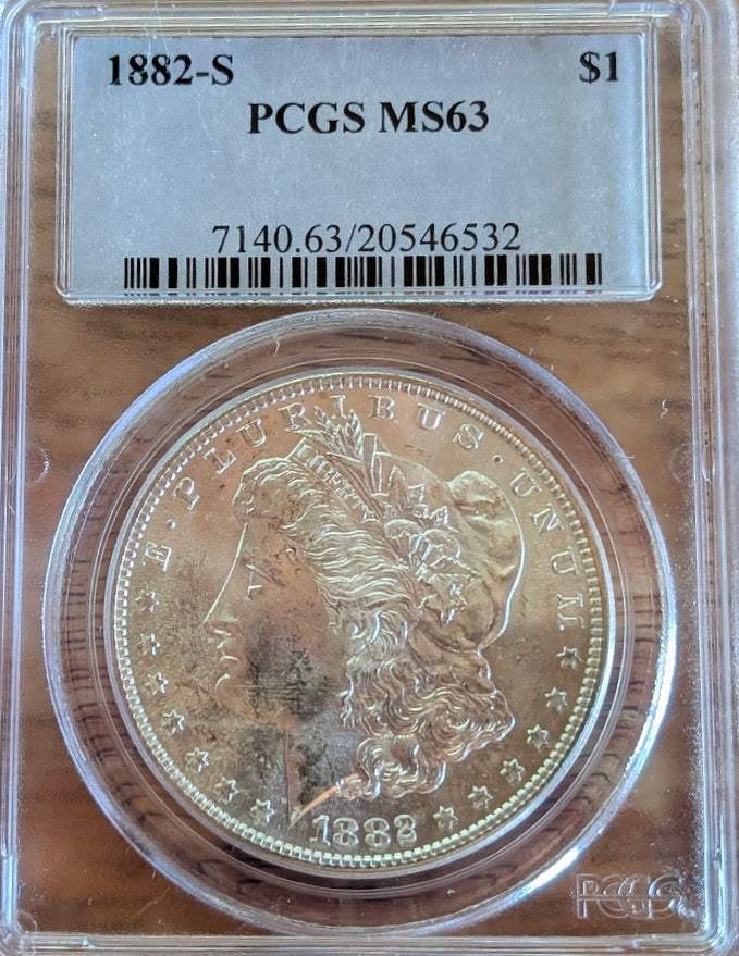 1882-S Morgan Silver Dollar with Lady Liberty design, PCGS MS63 grade, collectible coin.