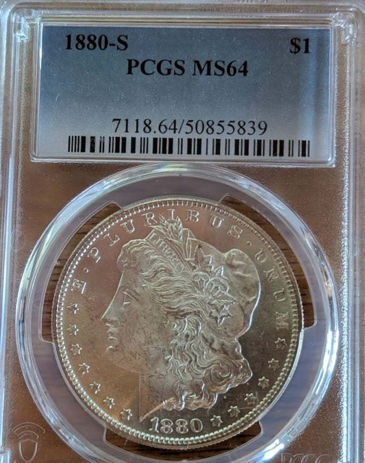 1880-S Morgan Silver Dollar in PCGS MS64 holder, showcasing Lady Liberty and an eagle design, ideal for numismatists.