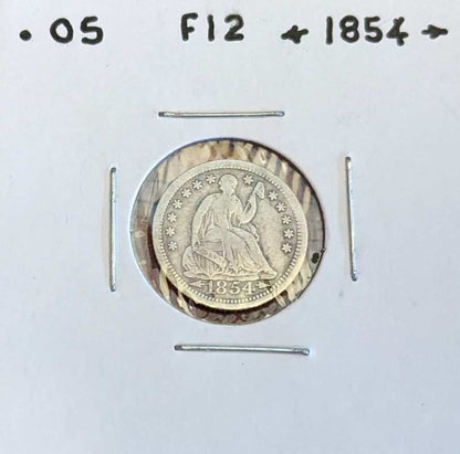 1854 Seated Liberty Half Dime with Arrows, rare collectible coin.