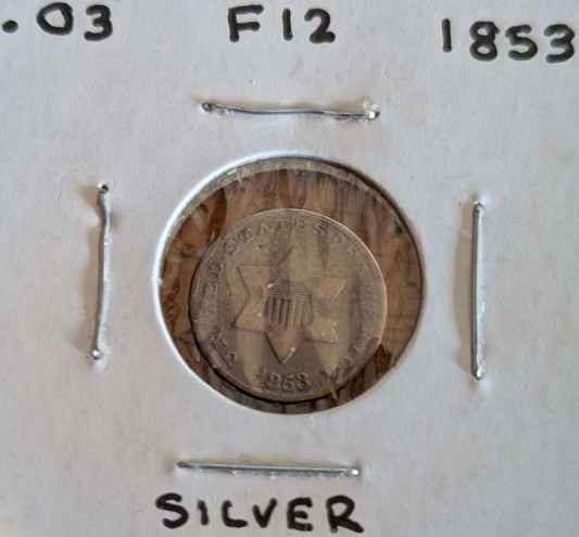 1853 silver three-cent piece in fine condition, valuable historical coin for collectors.