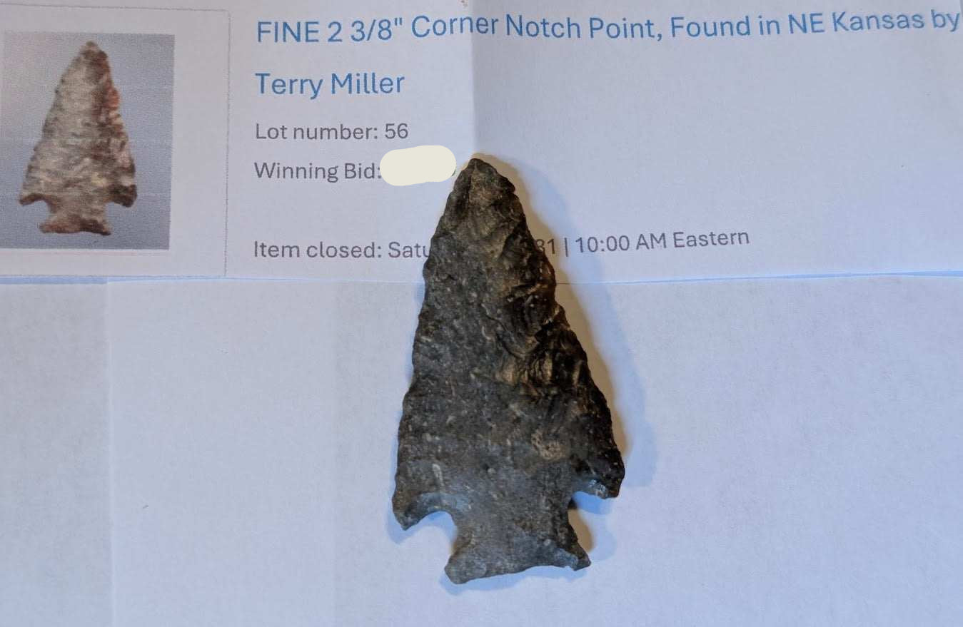 2 3/8 inch corner-notch arrowhead from Northeast Kansas made of dark chert with bilateral notches and sharp edges