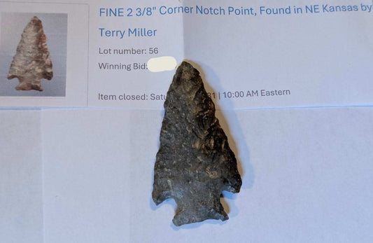 2 3/8 inch corner-notch arrowhead from Northeast Kansas made of dark chert with bilateral notches and sharp edges