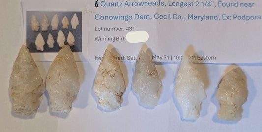 Set of six quartz arrowheads from Conowingo Dam, Maryland, longest measuring 2 1/4 inches, translucent to milky with triangular and corner-notched styles.