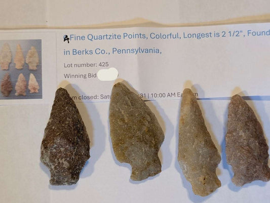 Set of 4 colorful quartzite arrowheads from Berks County, Pennsylvania, showing detailed flaking and weathered edges, longest 2.5 inches.