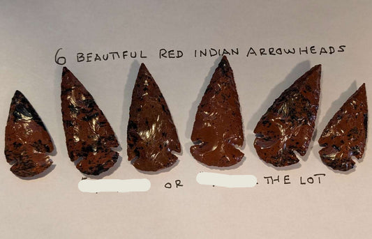 Set of 6 polished deep red jasper arrowheads with black obsidian veining, 2 to 2.75 inches long